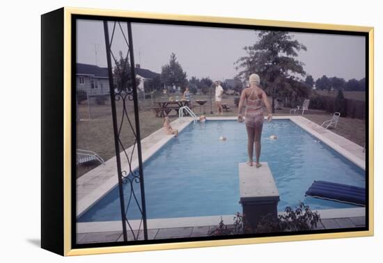 1959: Susan in Diving Stance During a Family Cookout, Trenton, New Jersey-Frank Scherschel-Framed Premier Image Canvas