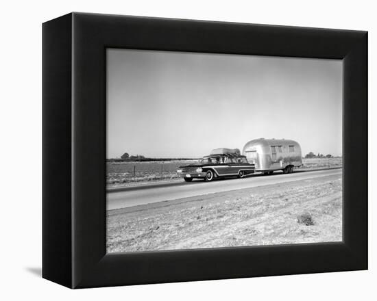 1960s-1970s Family Station Wagon and Camping Trailer Driving on Country Highway on Vacation-null-Framed Premier Image Canvas