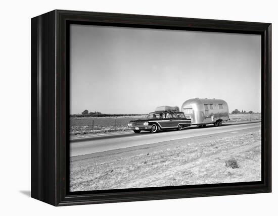 1960s-1970s Family Station Wagon and Camping Trailer Driving on Country Highway on Vacation-null-Framed Premier Image Canvas