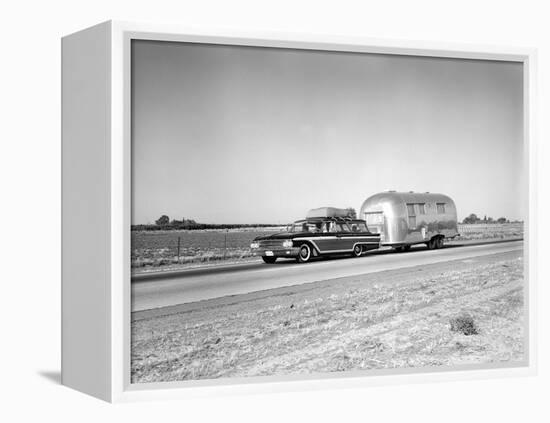 1960s-1970s Family Station Wagon and Camping Trailer Driving on Country Highway on Vacation-null-Framed Premier Image Canvas