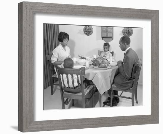 1960s AFRICAN AMERICAN FAMILY AT DINING TABLE WITH TURKEY SAYING GRACE PRAYING-Panoramic Images-Framed Photographic Print