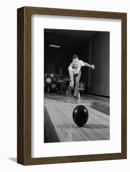 1960s MAN RELEASING BALL DOWN BOWLING ALLEY LANE-H. Armstrong Roberts-Framed Photographic Print