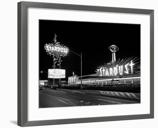 1960s Night Scene of the Stardust Casino Las Vegas,, Nevada-null-Framed Premium Photographic Print