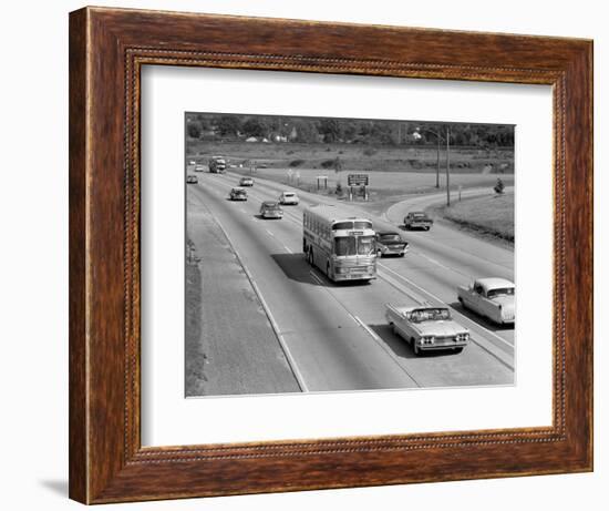 1960s Overhead of Busy Four Lane Undivided Highway with Convertible Car and Long Haul Passenger-null-Framed Photographic Print