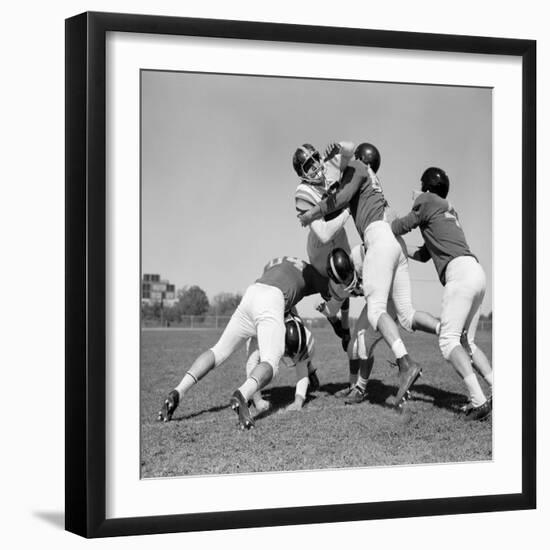 1960s SIX MEN PLAYING FOOTBALL GROUP TACKLE-H. Armstrong Roberts-Framed Photographic Print