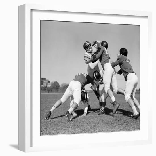 1960s SIX MEN PLAYING FOOTBALL GROUP TACKLE-H. Armstrong Roberts-Framed Photographic Print