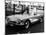 1961 Chevrolet Corvette on a Parking Meter, (C1961)-null-Mounted Photographic Print