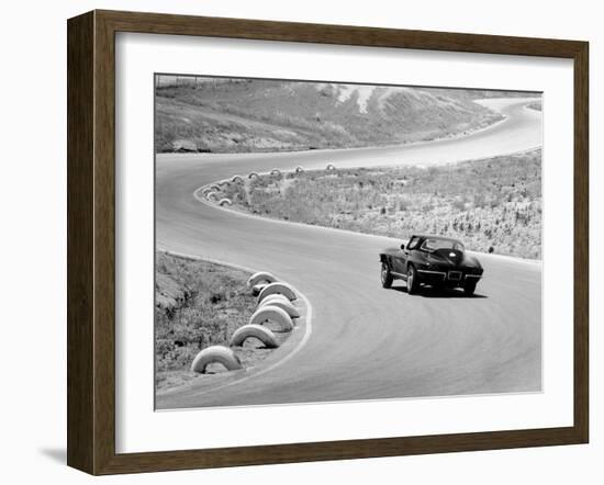 1964 Chevrolet Corvette Stingray on a Winding Racetrack, (C1964)-null-Framed Photographic Print