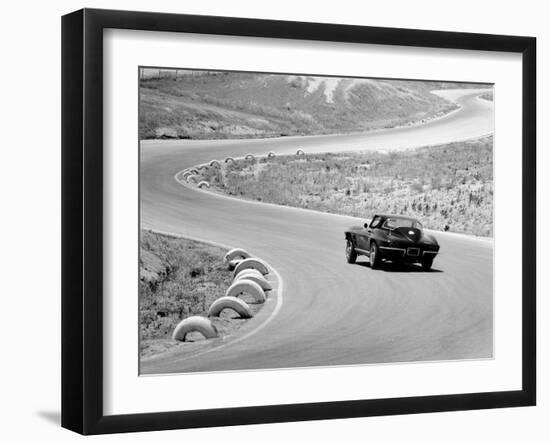 1964 Chevrolet Corvette Stingray on a Winding Racetrack, (C1964)-null-Framed Photographic Print