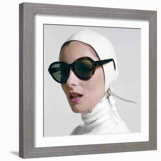 1970s PORTRAIT SMILING WOMAN WEARING DESIGNER FASHION WHITE TURTLE NECK LEATHER AVIATOR HELMET L...-H. Armstrong Roberts-Framed Photographic Print