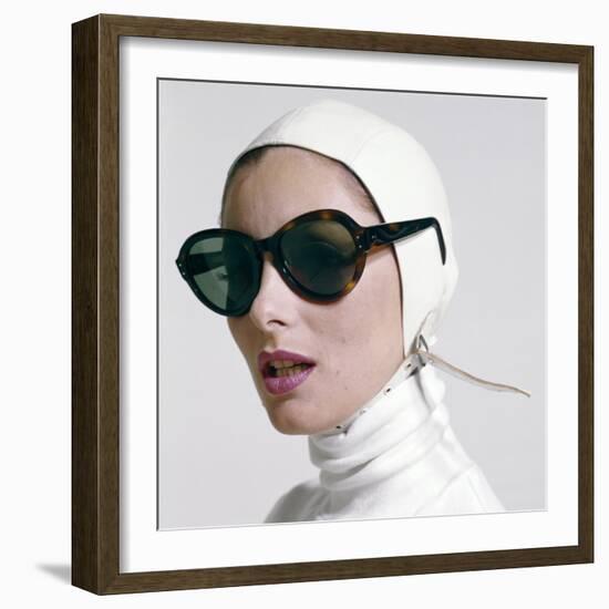 1970s PORTRAIT SMILING WOMAN WEARING DESIGNER FASHION WHITE TURTLE NECK LEATHER AVIATOR HELMET L...-H. Armstrong Roberts-Framed Photographic Print