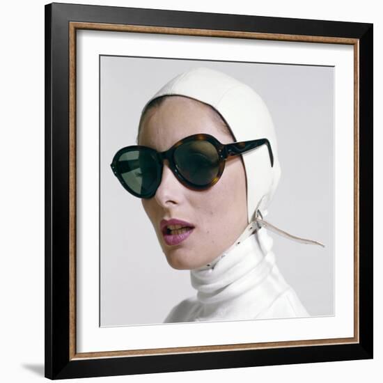 1970s PORTRAIT SMILING WOMAN WEARING DESIGNER FASHION WHITE TURTLE NECK LEATHER AVIATOR HELMET L...-H. Armstrong Roberts-Framed Photographic Print