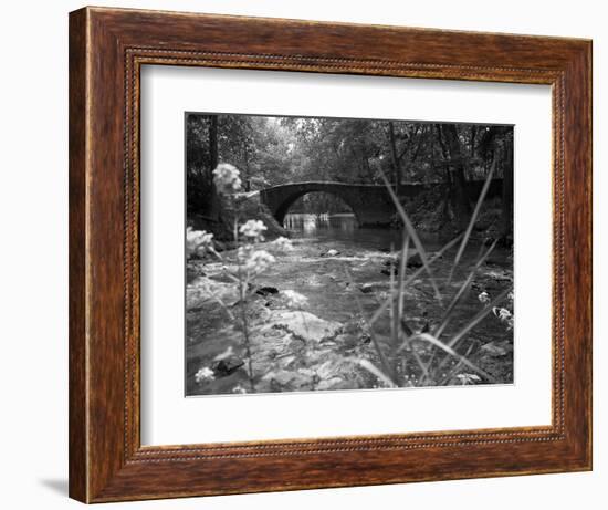 1970s Stream with Stone Bridge in Wooded Area-null-Framed Photographic Print