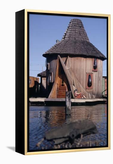 1971: Floating-Home Owner Mary Holt Sunbathes on the Deck of Her House, Sausalito, California-Michael Rougier-Framed Premier Image Canvas
