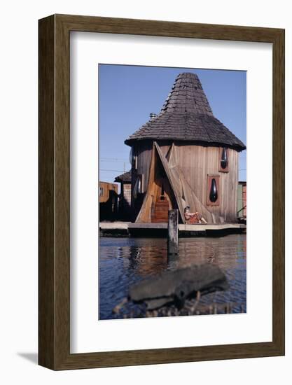 1971: Floating-Home Owner Mary Holt Sunbathes on the Deck of Her House, Sausalito, California-Michael Rougier-Framed Photographic Print