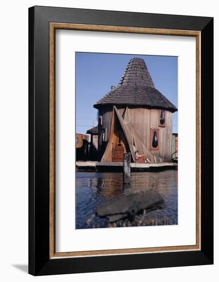 1971: Floating-Home Owner Mary Holt Sunbathes on the Deck of Her House, Sausalito, California-Michael Rougier-Framed Photographic Print