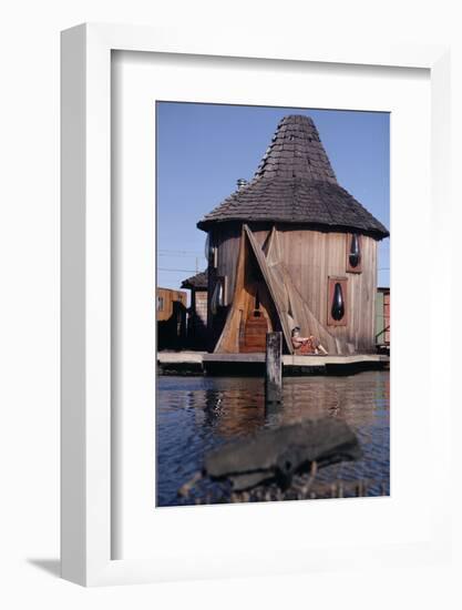 1971: Floating-Home Owner Mary Holt Sunbathes on the Deck of Her House, Sausalito, California-Michael Rougier-Framed Photographic Print