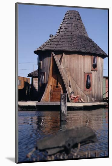 1971: Floating-Home Owner Mary Holt Sunbathes on the Deck of Her House, Sausalito, California-Michael Rougier-Mounted Photographic Print