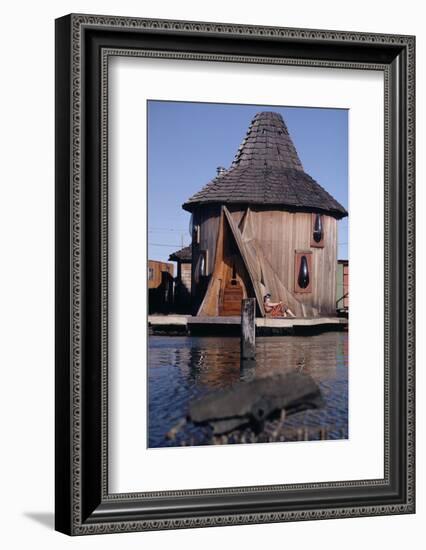 1971: Floating-Home Owner Mary Holt Sunbathes on the Deck of Her House, Sausalito, California-Michael Rougier-Framed Photographic Print