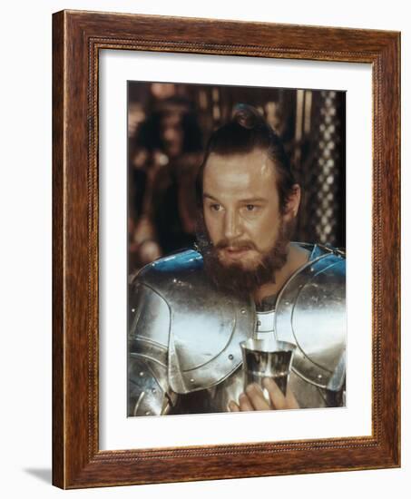 , 1981 --- British actor Liam Neeson as Gawain in the, 1981 film "Excalibur", directed by British d-null-Framed Photo