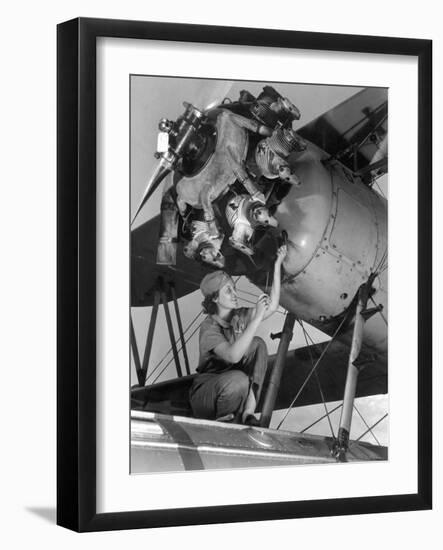 20 Year Old Women and Expert Aviation Mechanic Working on a Wright Whirlwind Airplane Motor-null-Framed Photo