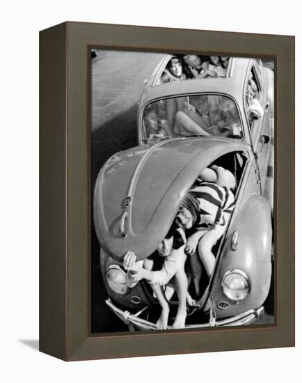 31 Teenagers Stuffed into a Volkswagen Beetle-null-Framed Stretched Canvas