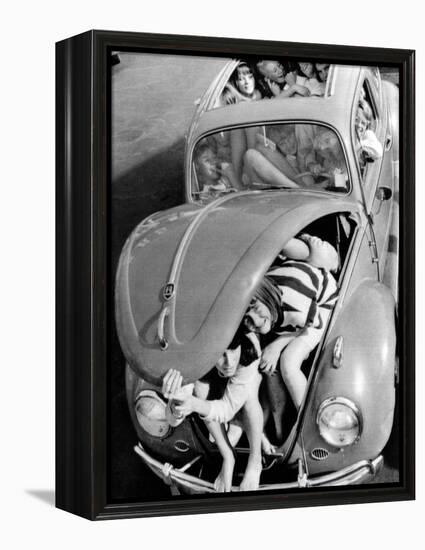 31 Teenagers Stuffed into a Volkswagen Beetle-null-Framed Stretched Canvas