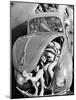 31 Teenagers Stuffed into a Volkswagen Beetle-null-Mounted Photo