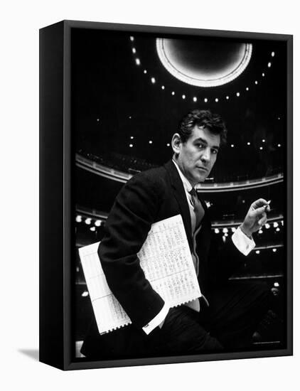 36 Year Old Composer Leonard Bernstein, Holding Musical Score with Lighted Auditorium Behind Him-Gordon Parks-Framed Premier Image Canvas