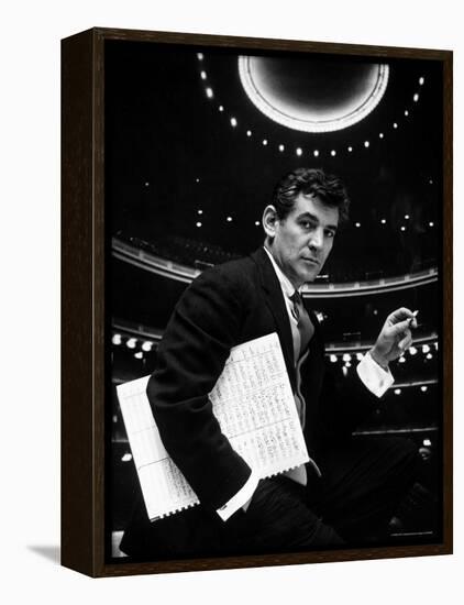 36 Year Old Composer Leonard Bernstein, Holding Musical Score with Lighted Auditorium Behind Him-Gordon Parks-Framed Premier Image Canvas