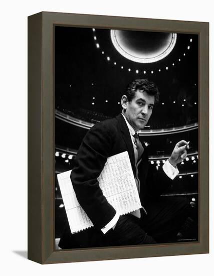 36 Year Old Composer Leonard Bernstein, Holding Musical Score with Lighted Auditorium Behind Him-Gordon Parks-Framed Premier Image Canvas