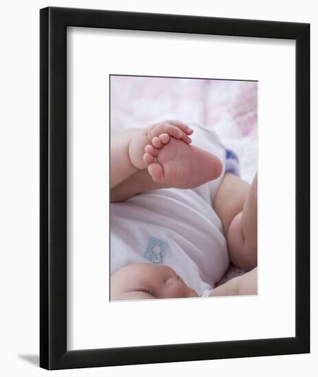 4 Month Old Baby Girl Holding Her Foot-Amanda Hall-Framed Photographic Print