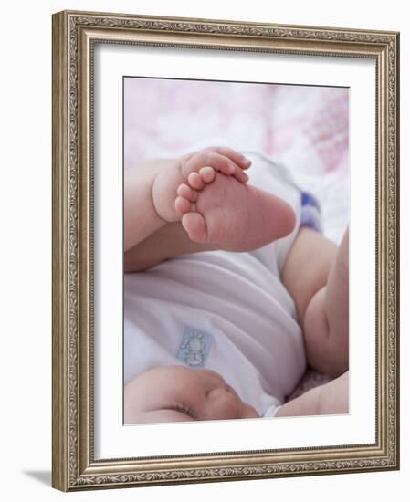 4 Month Old Baby Girl Holding Her Foot-Amanda Hall-Framed Photographic Print