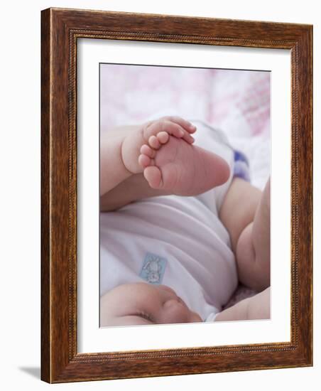 4 Month Old Baby Girl Holding Her Foot-Amanda Hall-Framed Photographic Print