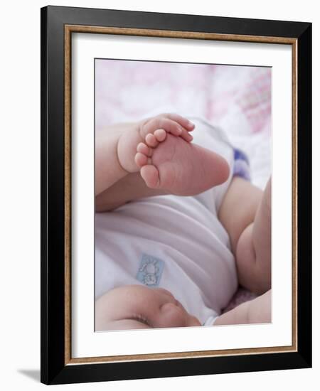 4 Month Old Baby Girl Holding Her Foot-Amanda Hall-Framed Photographic Print