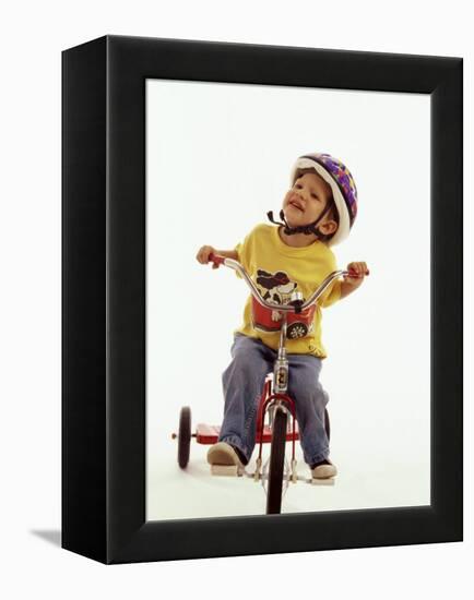 4 Year Old Boy Posing on His Tricycle, New York, New York, USA-Paul Sutton-Framed Premier Image Canvas