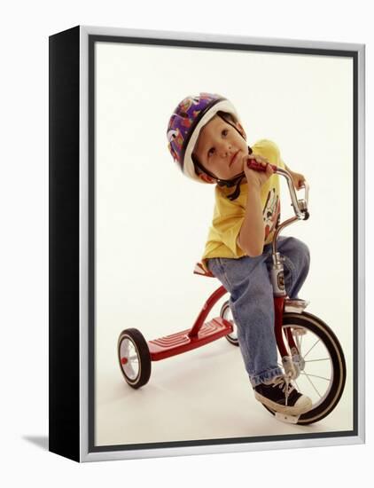 4 Year Old Boy Posing on His Tricycle, New York, New York, USA-Paul Sutton-Framed Premier Image Canvas