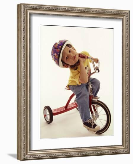 4 Year Old Boy Posing on His Tricycle, New York, New York, USA-Paul Sutton-Framed Photographic Print