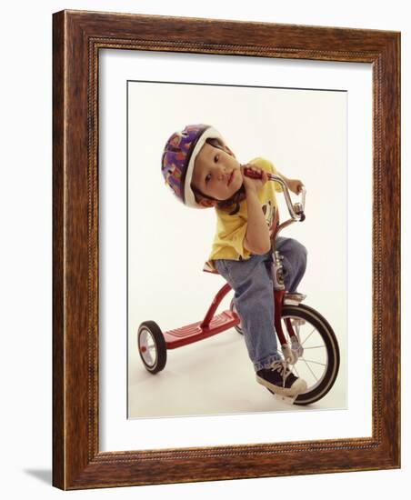 4 Year Old Boy Posing on His Tricycle, New York, New York, USA-Paul Sutton-Framed Photographic Print