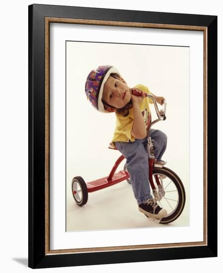 4 Year Old Boy Posing on His Tricycle, New York, New York, USA-Paul Sutton-Framed Photographic Print