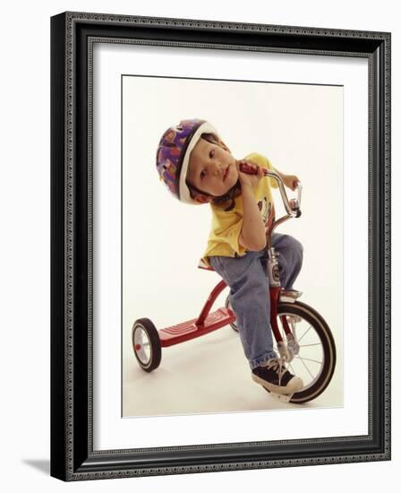 4 Year Old Boy Posing on His Tricycle, New York, New York, USA-Paul Sutton-Framed Photographic Print