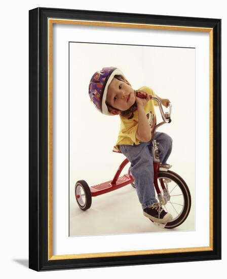 4 Year Old Boy Posing on His Tricycle, New York, New York, USA-Paul Sutton-Framed Photographic Print