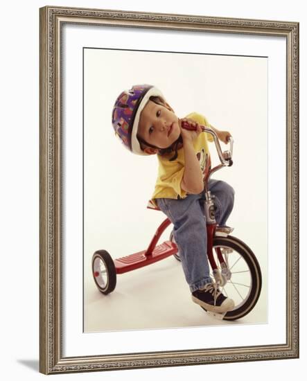 4 Year Old Boy Posing on His Tricycle, New York, New York, USA-Paul Sutton-Framed Photographic Print