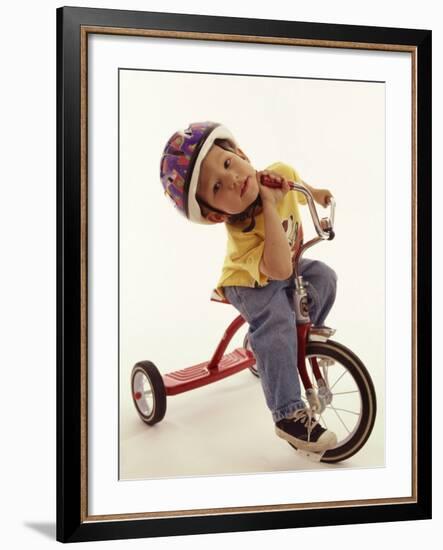 4 Year Old Boy Posing on His Tricycle, New York, New York, USA-Paul Sutton-Framed Photographic Print