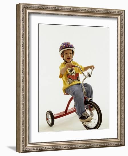 4 Year Old Boy Posing on His Tricycle, New York, New York, USA-Paul Sutton-Framed Photographic Print