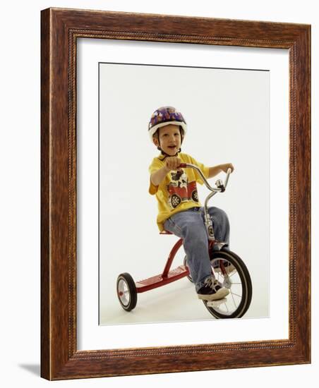 4 Year Old Boy Posing on His Tricycle, New York, New York, USA-Paul Sutton-Framed Photographic Print