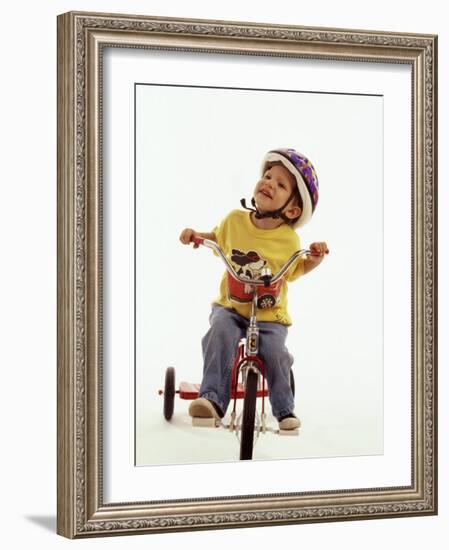 4 Year Old Boy Posing on His Tricycle, New York, New York, USA-Paul Sutton-Framed Photographic Print