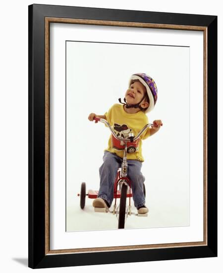 4 Year Old Boy Posing on His Tricycle, New York, New York, USA-Paul Sutton-Framed Photographic Print