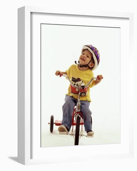 4 Year Old Boy Posing on His Tricycle, New York, New York, USA-Paul Sutton-Framed Photographic Print