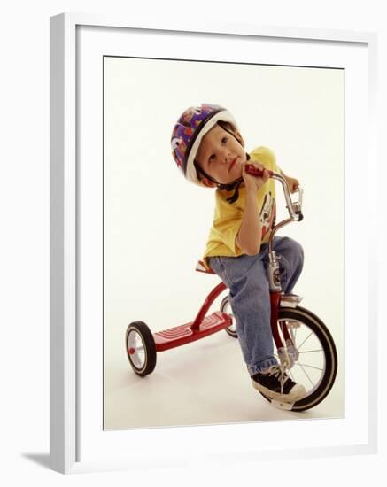 4 Year Old Boy Posing on His Tricycle, New York, New York, USA-Paul Sutton-Framed Photographic Print